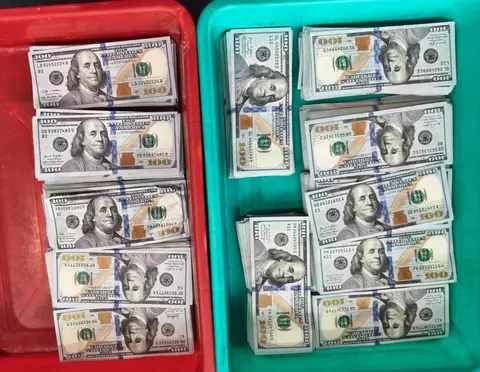 CISF Kolkata Airport screeners find USD 1.19 lakh hidden in false-bottom bags of Bangkok-bound flyers